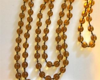 $45 Extra Long individually knotted glass beaded necklace 48" L 