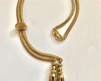 $20 Tassle adjustable gold tone necklace signed "Monet" 