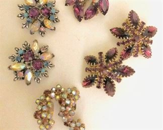 $10 each clip rhinestone earrings purples....