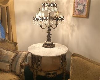 Beautiful marble-top end table and vintage brass lamp.