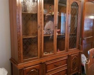 Vintage MCM Mid Century Solid wood with burled accents China Cabinet & Hutch, Dining Room Table w/3 Leafs & 6 Lenore chair Co. Cane back, green padded fabric seat Chairs (2 arm & 4 side) Table 64"W x 44"D x 29"H leafs 12"W each China cabinet 60"W x 17"D x 765.25"H Entire Set WAS $1995 NOW $1495