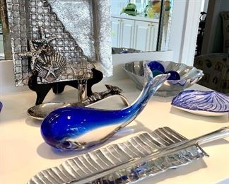 $28 - Blue Glass Whale.  $28 - Ocean Themed Serving Tray and Spoon. $12 - Leaf Tray