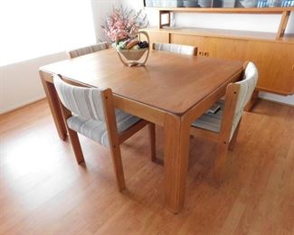 Made in Denmark table with chairs made by Illum Wikkelso for Niels Eilersen. 