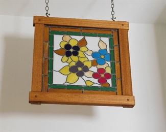 One of several stained glass wall hangings. This one is large and approximately 3 x 3