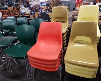 Assorted Brunswick Fiberglass Chairs $95 Each 16 available        Vintage Orange Plastic MCM Stack Chairs $50 each 4 available