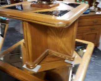 Solid Oak & smoke glass insert paneled Coffee table & end table Coffee Table : 37.5"W x 37.5"D x 16"H  End Table: 28"W x 28"D x 21"H     $495 for set