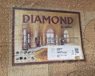 63" x 91" Diamond Salmon & Taupe Area Rug (needs cleaning)  $85