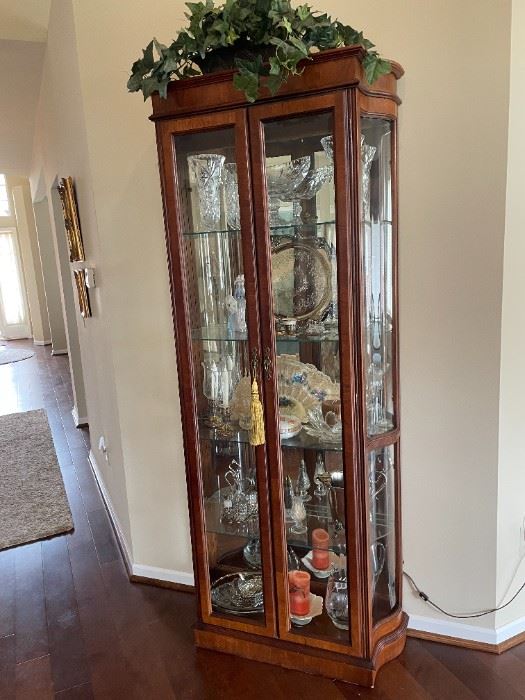 . . . a beautiful curio cabinet filled with crystal treasures!