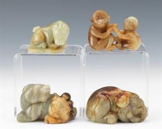 A Group of Four Carved Jadeite Animal and Mythical Figurines 