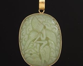 Carved Jade and Gold Pendant 
