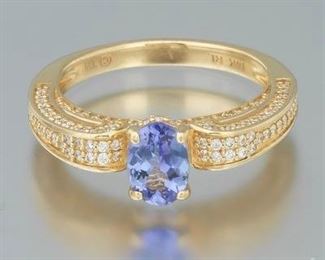 Ladies Gold, Tanzanite and Diamond Scroll Ring 