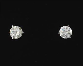 Ladies Pair of Gold and 0.95 ct Total Diamond Solitaire Studs 