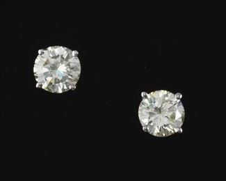 Ladies Pair of Gold and 1.25 ct Total Diamond Solitaire Studs 