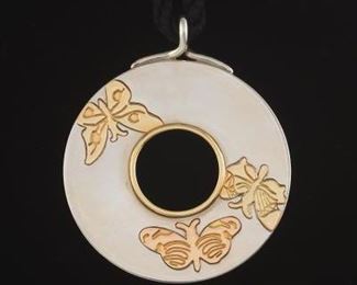 Tiffany Co. Sterling Silver and Gold Medallion on Chord 