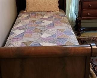 Vintage twin claw foot bed