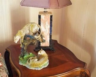 One of two matching marble lamps