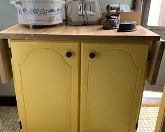 Yellow Cabinet with foldable top