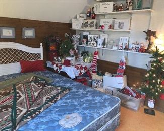 Christmas room filled with Dept. 56 items and cute small trees