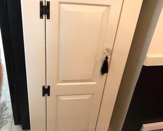 Narrow freestanding cabinet