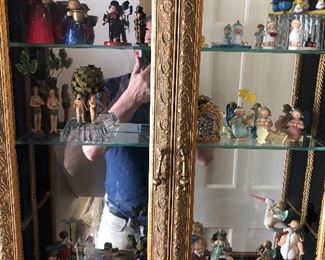 Lovely hanging display cabinet with German carved wood collectibles