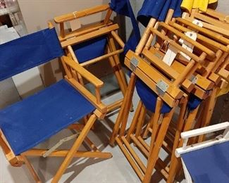 Several canvas folding deck chairs
