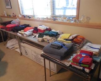 Misc linens; glass birds on ledge