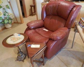 Leather "big man" recliner; small drop leaf table; table with hand-painted china top and metal base
