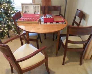 Round maple table; 6 chairs from Pottery Barn