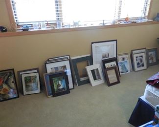 Lots of pictures and picture frames
