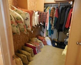 Lots of throw pillows; coats