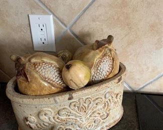 $48- Stoneware basket with artificially fruit 