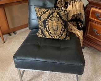 $55~ FAUX LEATHER AND CHROME CHAIR 