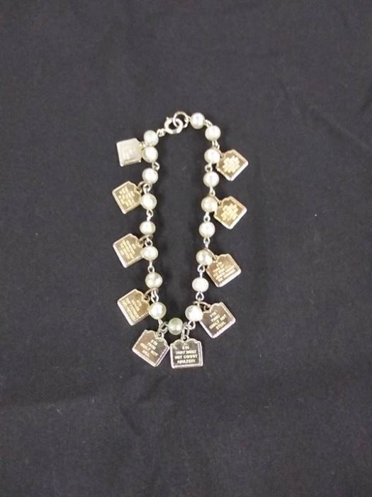 Ten Commandments charm bracelet, & Holy Family pins