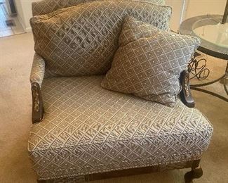 Regency style leopards Paw Loos pillow back chair
Finish ;Calais/ Gold
With 34 inches deep 34 1/2 inches
height 36 inches seat height 20 1/2
inches arm height 24 1/2 inches designed by John Mascheroni
$700