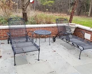 Several pieces of high quality metal patio furniture, including chaise lounges, side tables, dining table and six chairs $1000