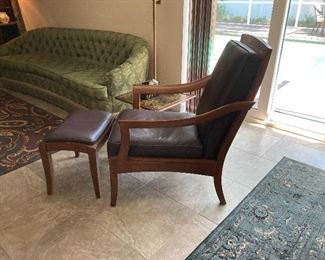 VINTAGE FAUX LEATHER SLING CHAIR AND OTTOMAN. 