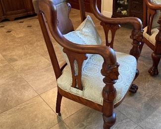 19TH CENTURY ANTIQUE PARLOR CHAIR WITH CARVED HEAD AND CLAW FOOT