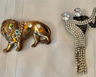 $20 ea - Lion and rhinestone pin Dancers on right: 3" H, 2" W. 