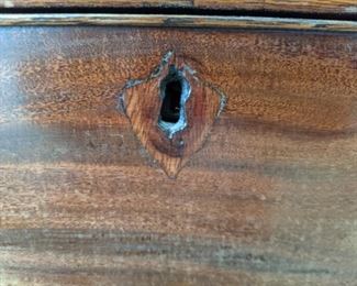 Original wooden keyhole lock.