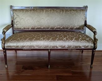 Wonderful antique mahogany frame settee, with winged gilt bronze mounts, freshly upholstered.