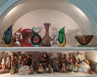 Top shelf is a few Italian Murano glass items, ABCG and Sèvres crystal.                                                                                   Then, it all begins - the Hummel avalanche.