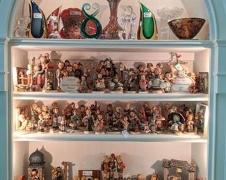 LAWD!                                                                                          Hummel-Palooza has befallen the Atlanta Country Club.                                                                                       This couple had relatives on both sides who collected these figurines, belonged to clubs, bought special editions, etc.                                                                                           SO, that means you get to come pick and choose to your heart's content, to add to your own collection - take a gander at the next nine pics to see how many figurines are in one place.