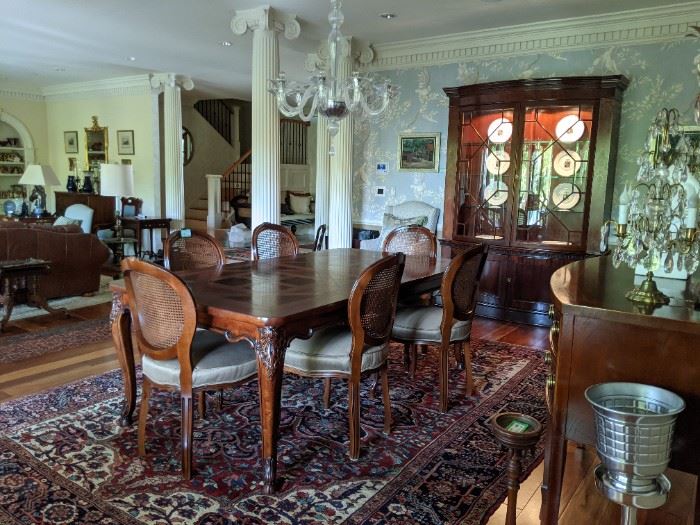 Gorgeous dining room suite, with vintage Henredon French Provincial parquet dining table, with matching chairs, Baker china cabinet, Baker Historic Charleston reproduction sideboard and fabby Persian Heriz rug.