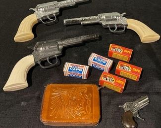 REDUCED!  $22.50 NOW, WAS  $30.00................Toy Cap Guns and Western Leather Wallet (B702)