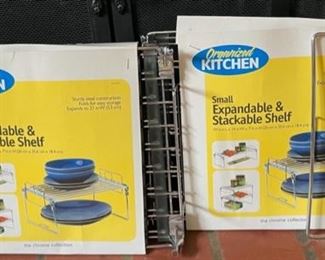 REDUCED!  $7.50 NOW, WAS $10.00.....................2 new expandable stackable Shelves (B194)
