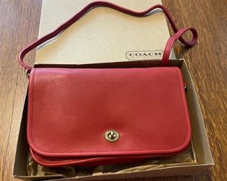 $50.00.....................Coach Purse with original box (B777)