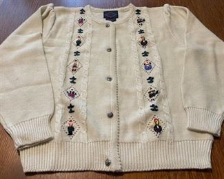 $16.00...................Kelsy Embroidered Sweater Size Large part wool (B753)