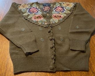 $14.00.......................Herman Geist Hand Embroidered Wool Sweater size Medium (B750)