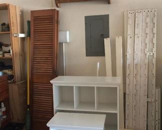 White bunk bed set, large and small bookcase, swivel doors, hanging quilt rack with western stars
