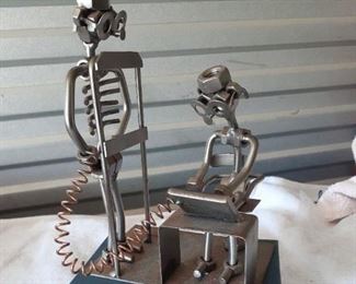 NEW Price $18.00  LOT 34     Metal Art of Dr and Skeleton  (blue box not included)
